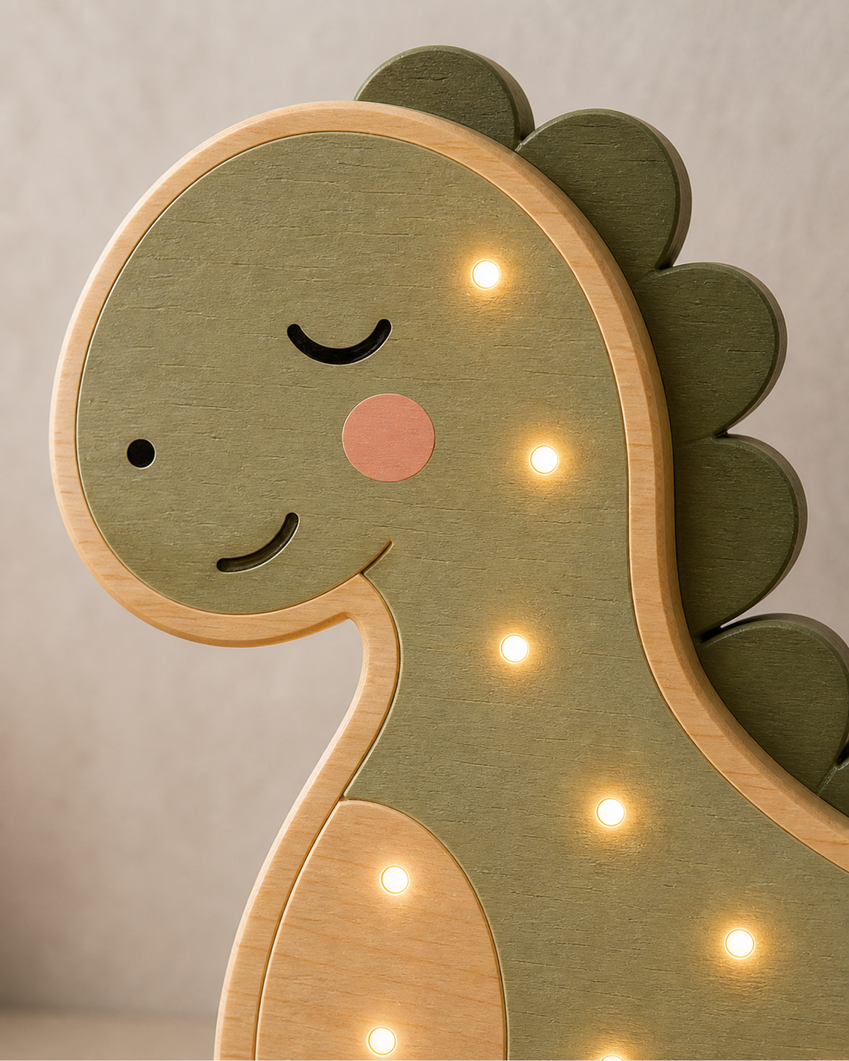 Lampe Dinosaure ORAWOOD, gros plan du visage et du bois