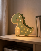 Lampe Dinosaure ORAWOOD, allumée dans une chambre au crépuscule