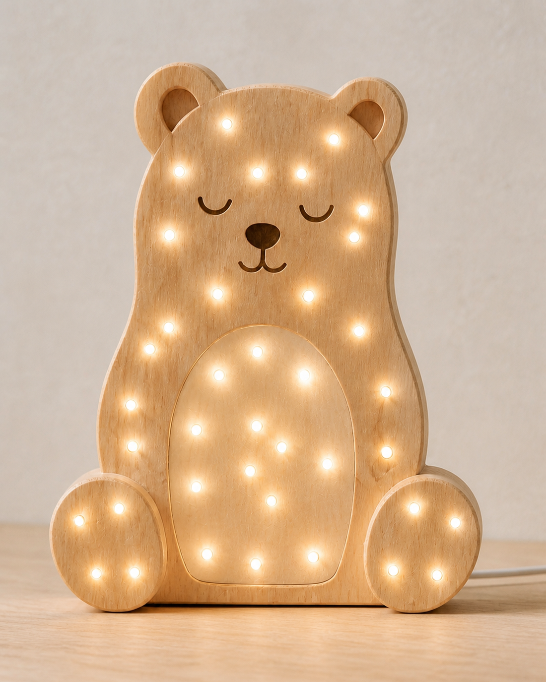 Lampe Ours ORAWOOD, détail du bois naturel et de la lumière chaude