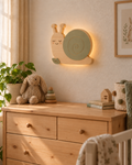 Visualisation illustrative de la lampe Escargot murale ORAWOOD avec halo lumineux arrière